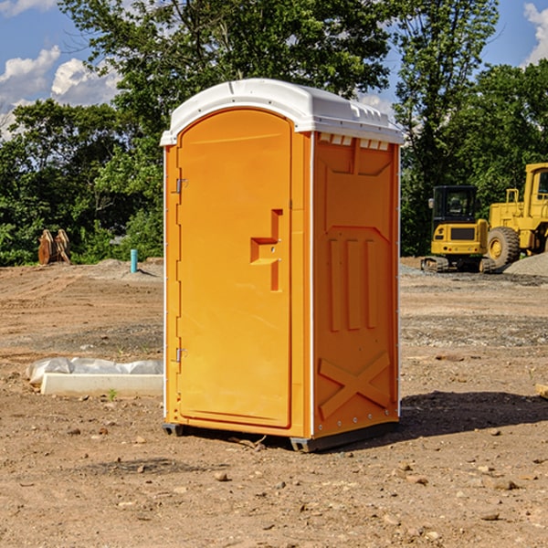 how often are the portable restrooms cleaned and serviced during a rental period in Lowell